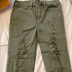 Army green ripped jeans